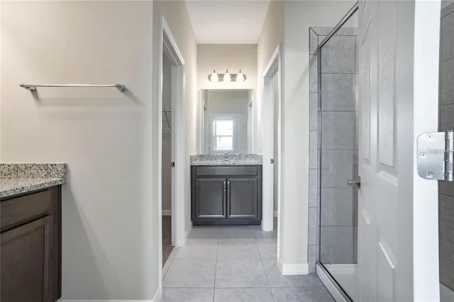 an aerial view of a house with a ocean view