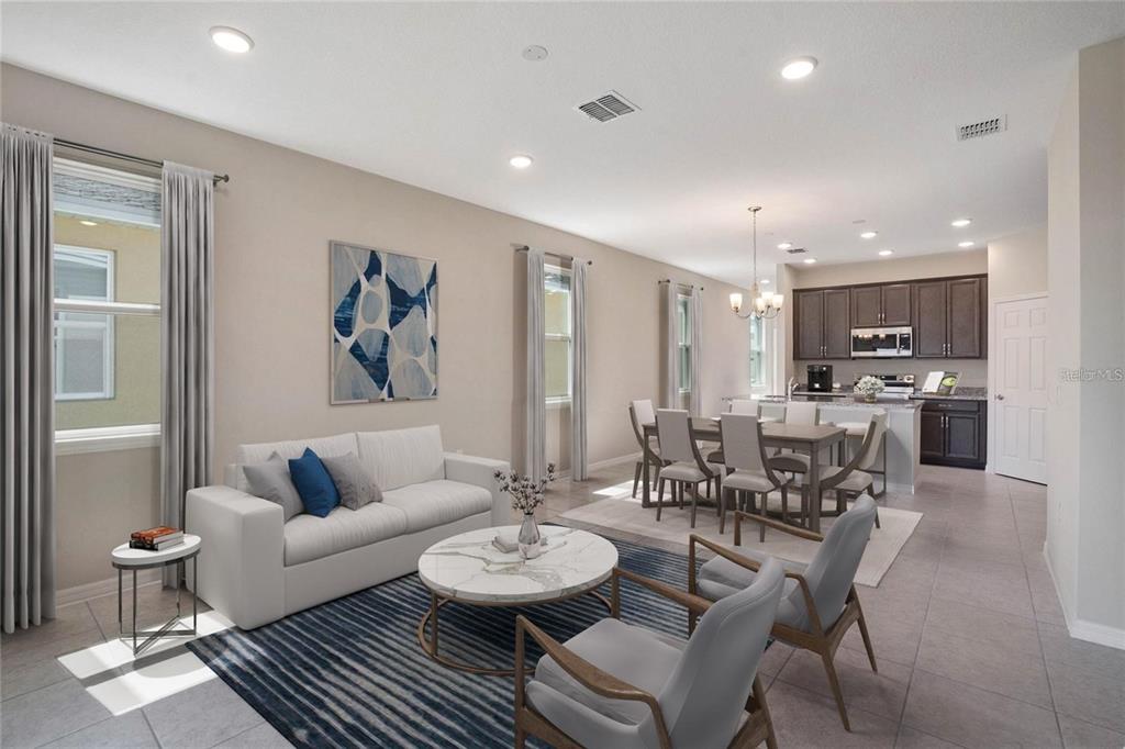 715 Poller Way Cocoa, FL 32927 - Photo 9 of 19 a living room with furniture and kitchen view