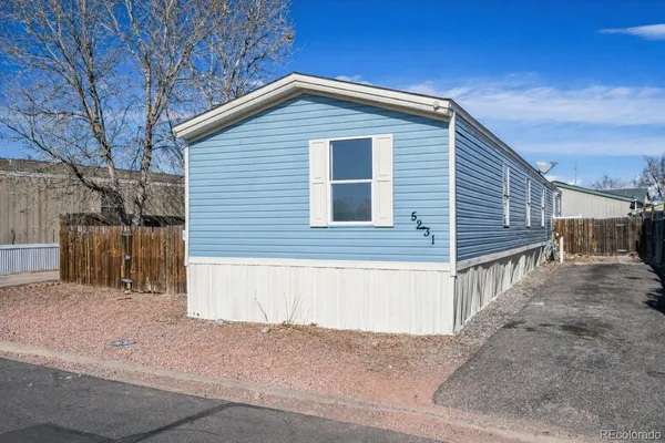 a front view of a house with a garage