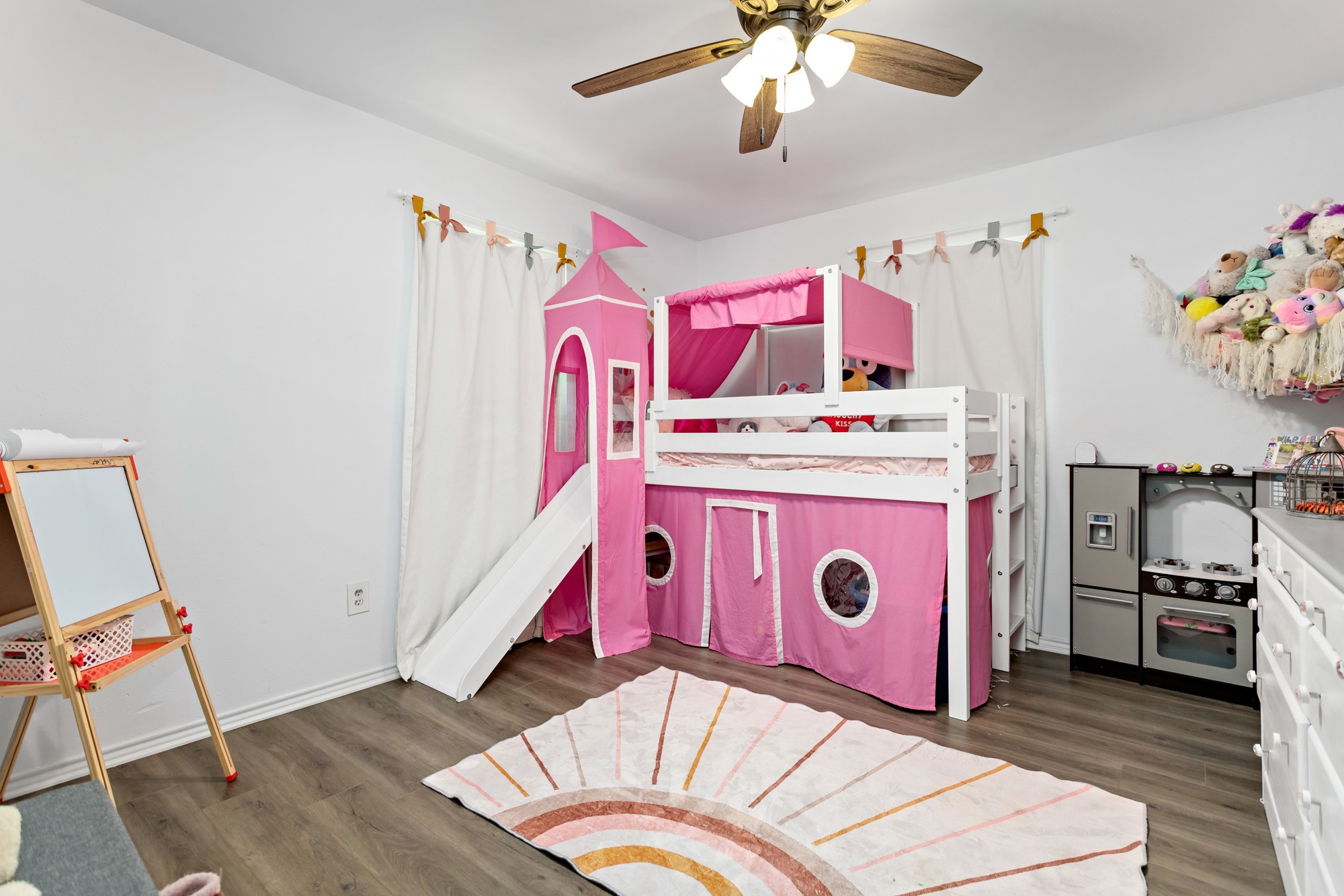 9994 Ruby Lane Silsbee, TX 77656 - Photo 15 of 17 a view of play room with furniture and wooden floor