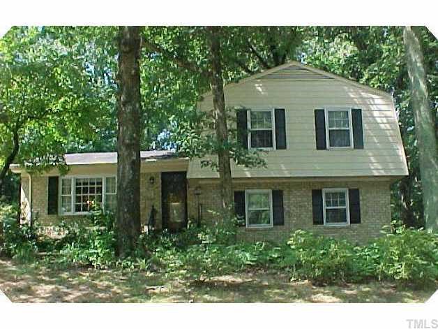 330 East Millbrook Road Raleigh, NC 27609 - Photo 1 of 1 a front view of a house with a yard