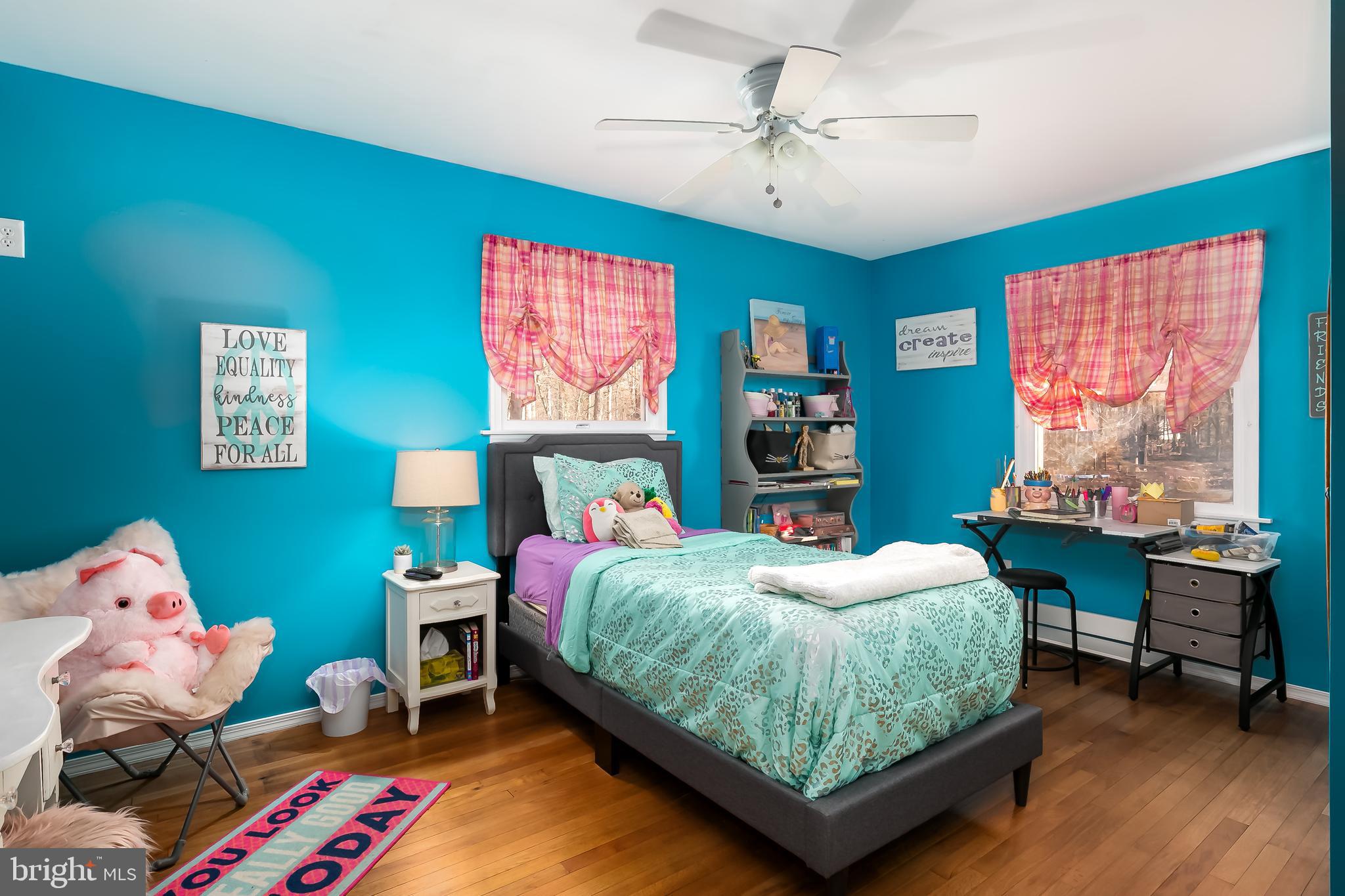 232 Oakshade Road Tabernacle, NJ 08088 - Photo 22 of 29 a bedroom with a bed and a table in it