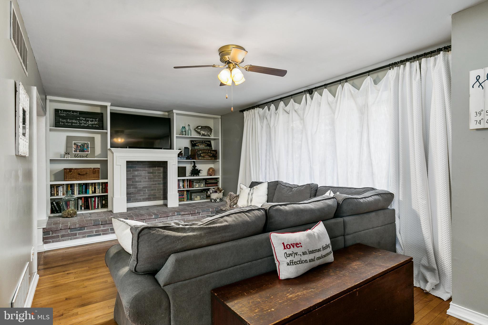 232 Oakshade Road Tabernacle, NJ 08088 - Photo 7 of 29 a living room with furniture window and a flat screen tv