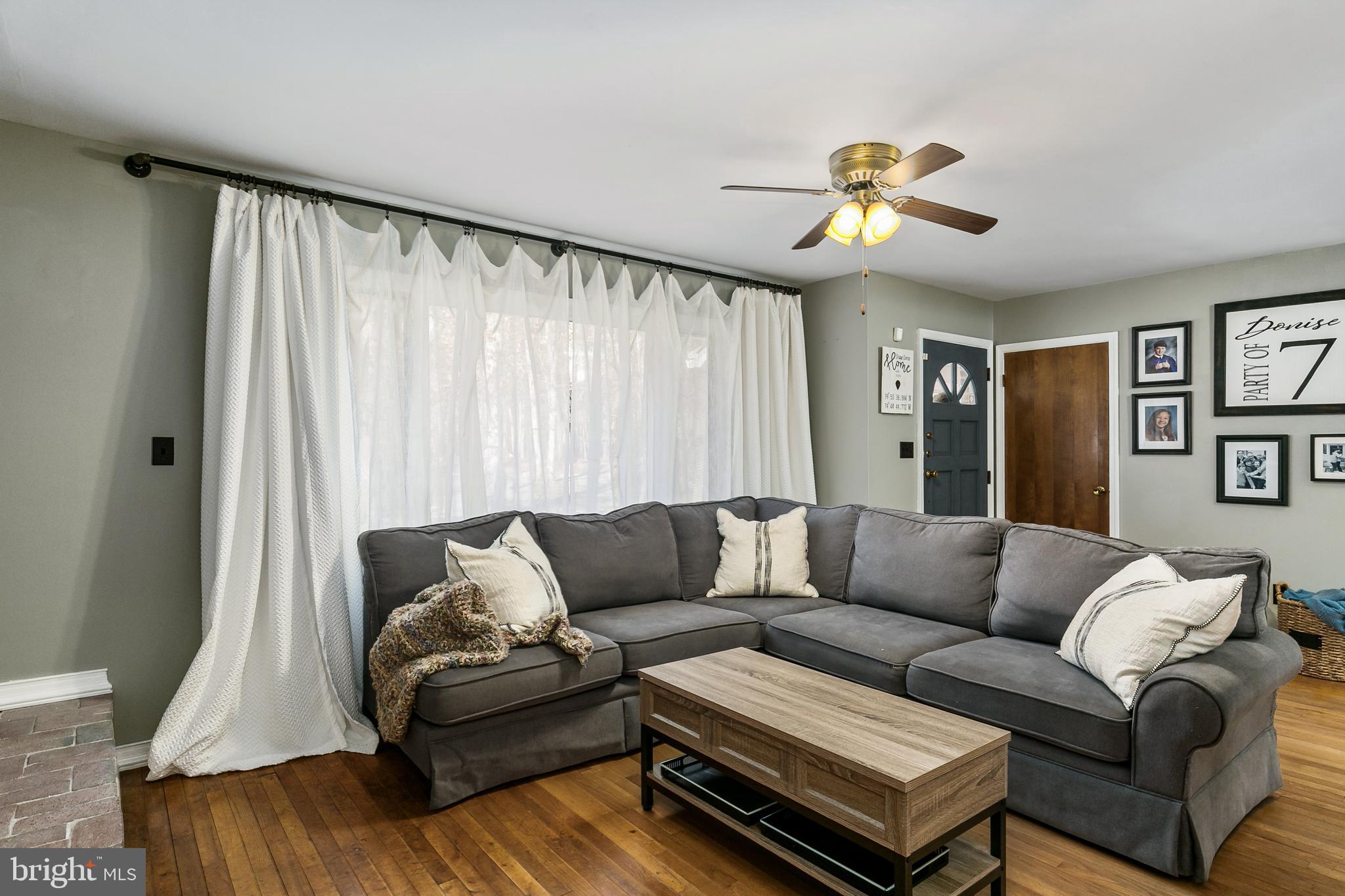 232 Oakshade Road Tabernacle, NJ 08088 - Photo 8 of 29 a living room with furniture and a chandelier
