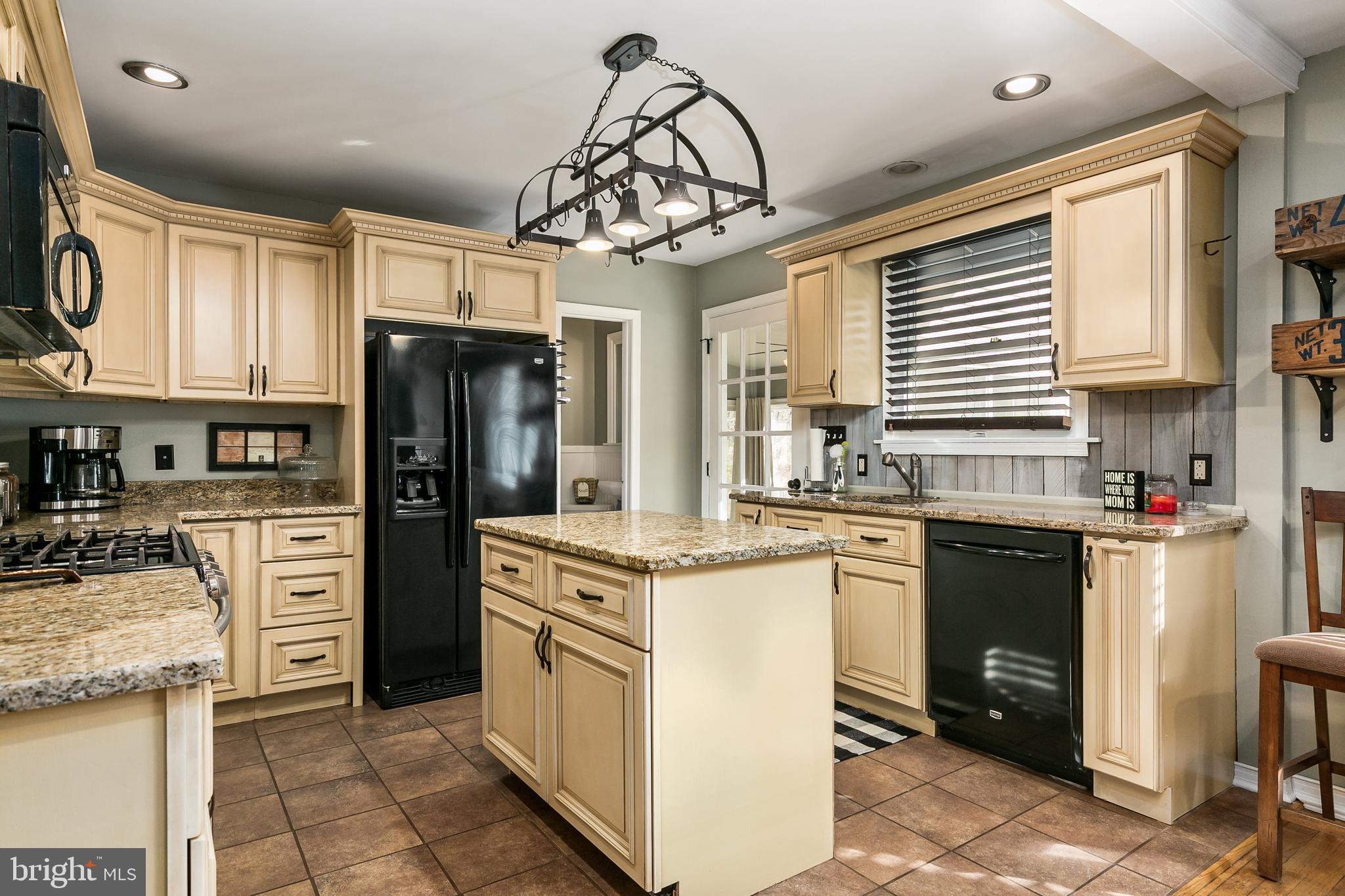 232 Oakshade Road Tabernacle, NJ 08088 - Photo 10 of 29 a kitchen with stainless steel appliances granite countertop a sink stove and refrigerator