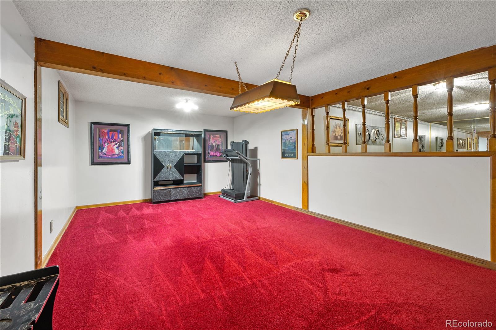 5311 Troy Street Denver, CO 80239 - Photo 36 of 46 a bed room with a bed and large window