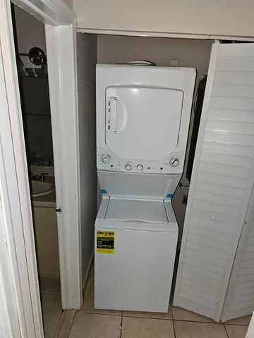 a utility room with a washer and dryer