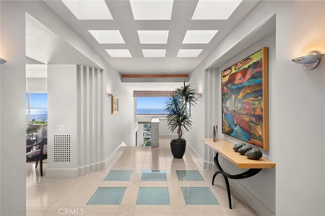 a view of entryway with furniture and rug