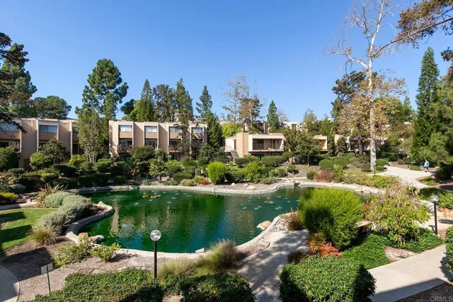 a view of a garden with a fountain