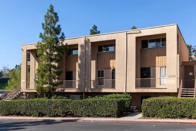 a view of a balcony with wooden floor