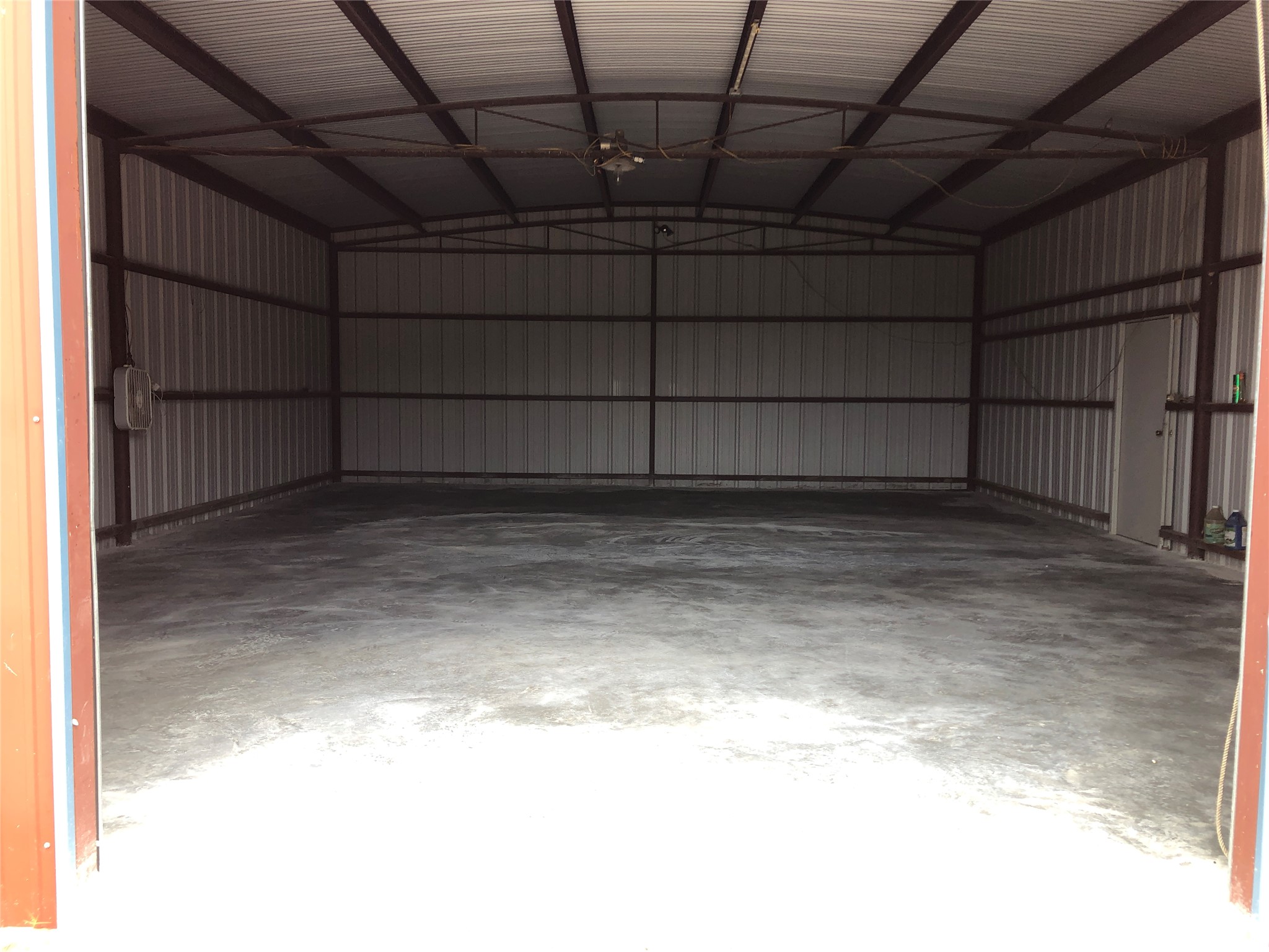 435 Spangenberg Road Blanco, TX 78606 - Photo 30 of 38 a view of a room with a wooden walls