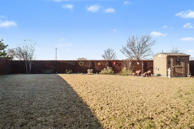 a street view with wooden fence