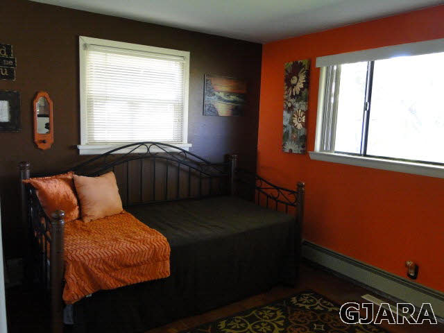 2335 J Road Grand Junction, CO 81505 - Photo 11 of 19 a bedroom with a bed and window