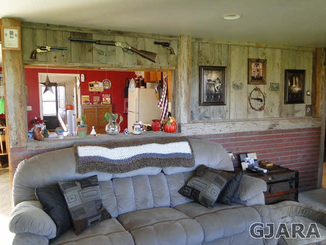2335 J Road Grand Junction, CO 81505 - Photo 3 of 19 a living room with furniture and a table