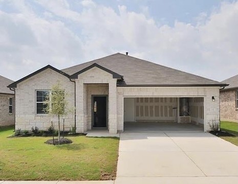 132 Mackinac Lane Georgetown, TX 78626 - Photo 1 of 1 front view of a house with a yard