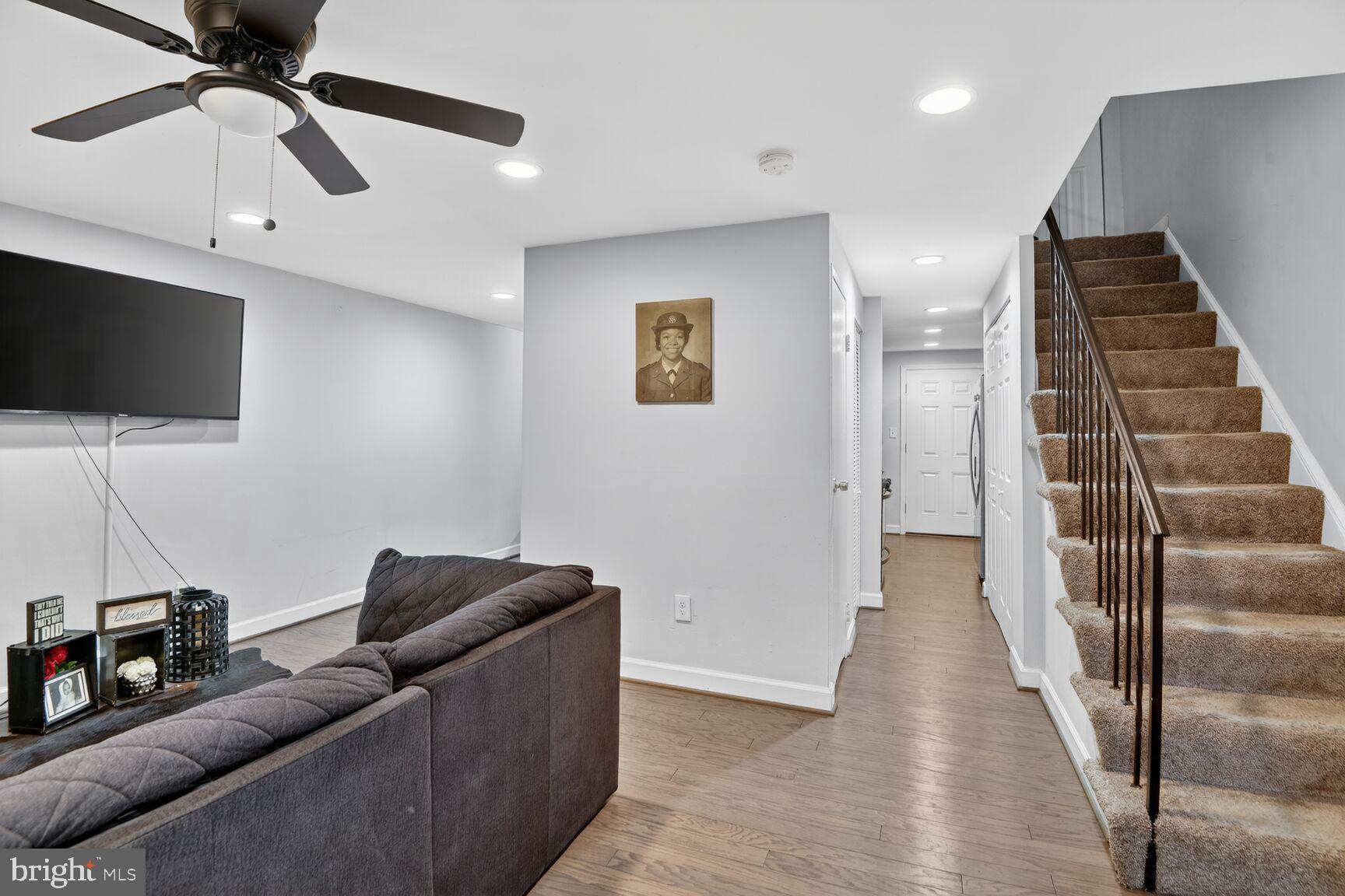 8110 Sheriff Road Landover, MD 20785 - Photo 2 of 15 a living room with furniture and a flat screen tv