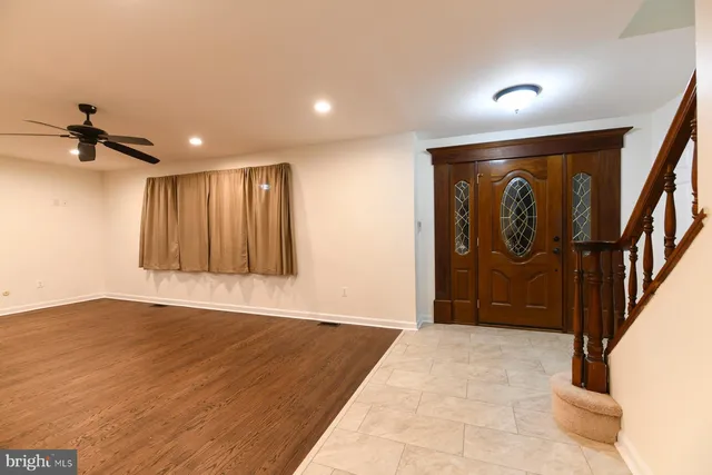 a view of a hallway with a chandelier