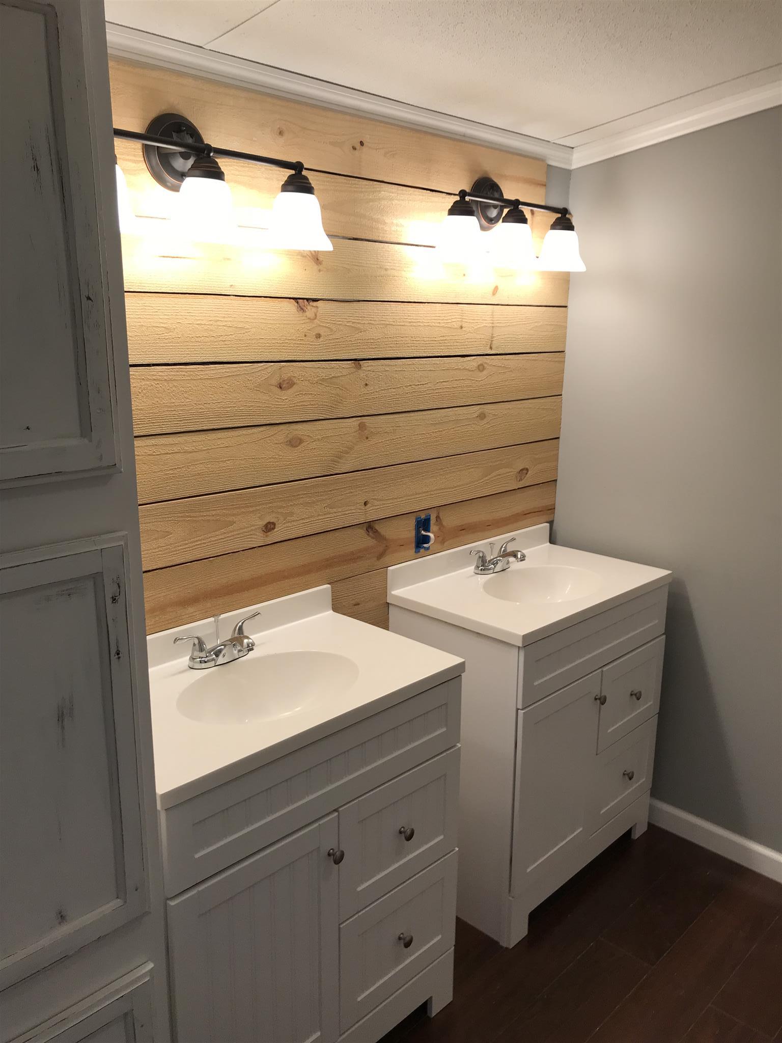 2849 Beasleys Bend Road Lebanon, TN 37087 - Photo 16 of 18 a bathroom with a sink and mirror
