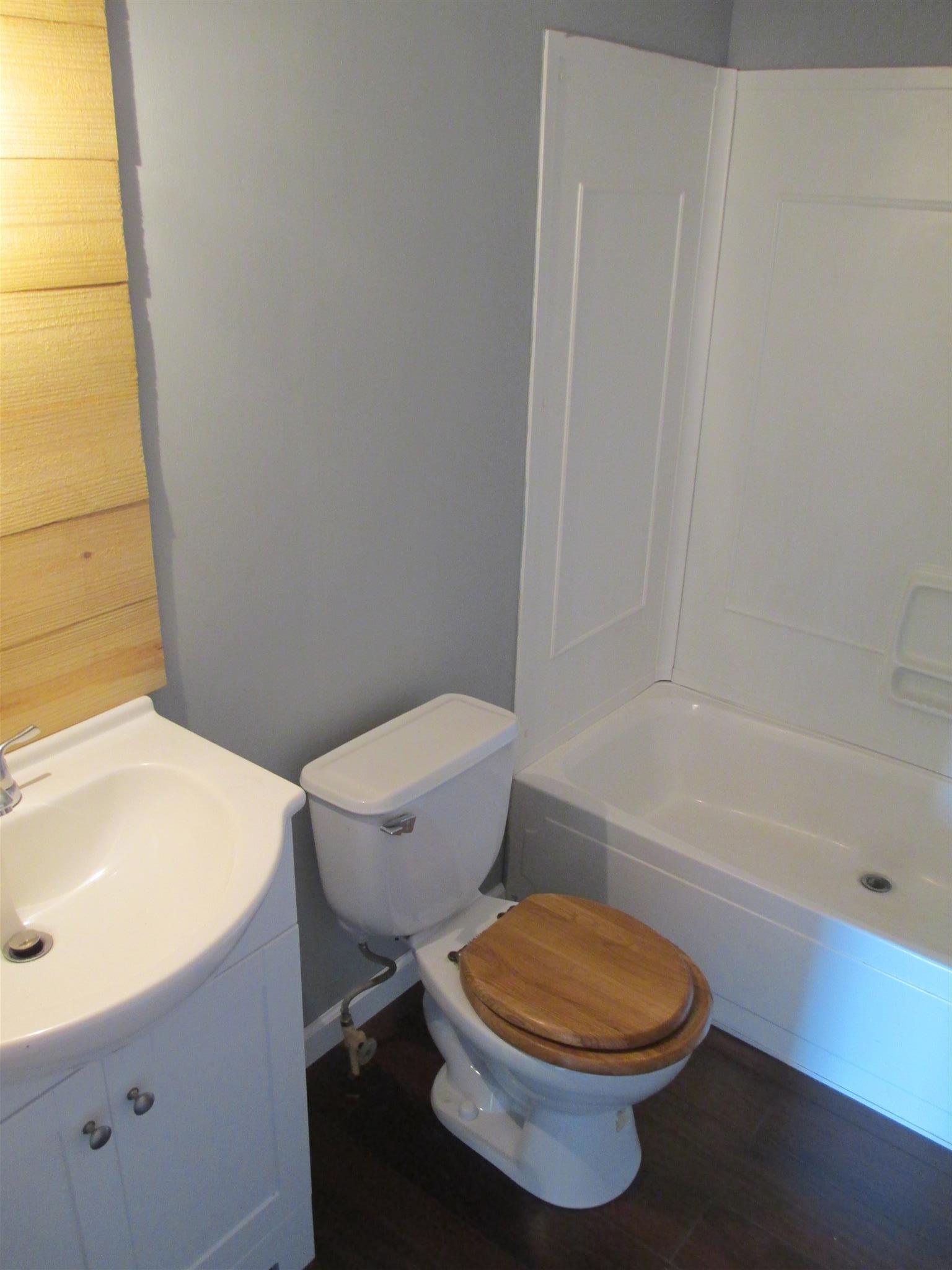 2849 Beasleys Bend Road Lebanon, TN 37087 - Photo 10 of 18 a white toilet sitting next to a bath tub