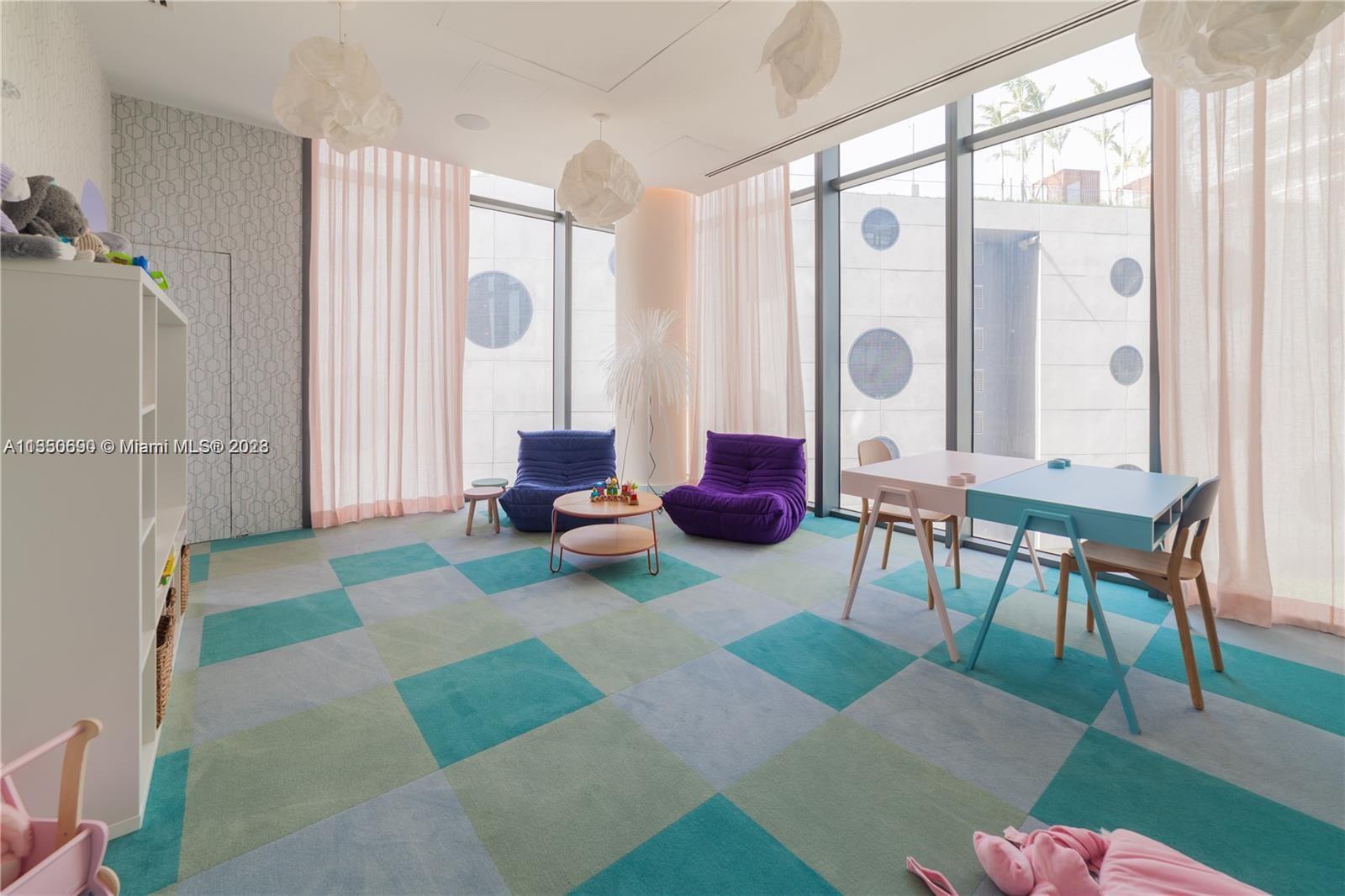 650 Northeast 32nd Street, Unit 4208 Miami, FL 33137 - Photo 13 of 18 a living room with furniture and a large window