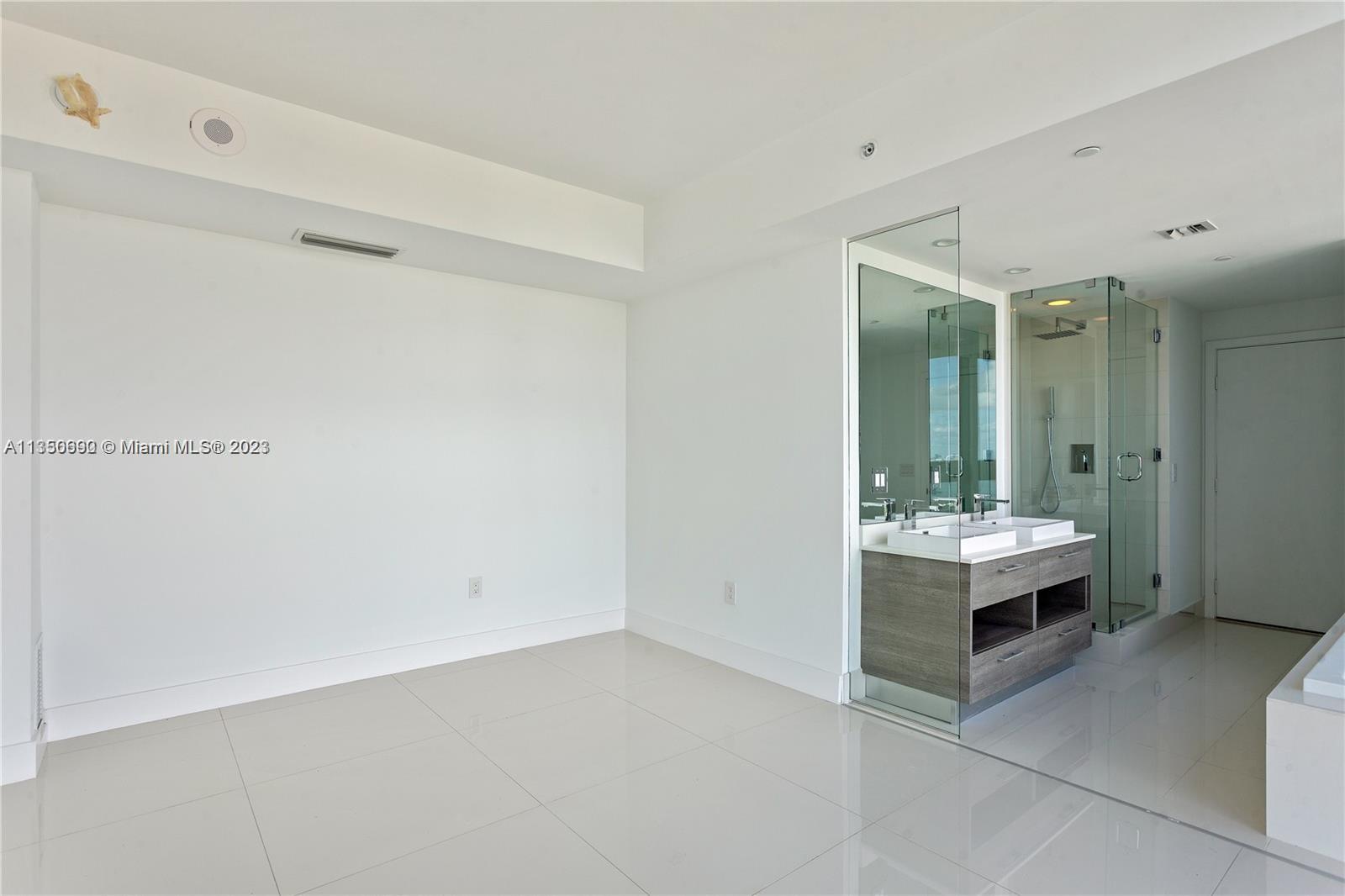 650 Northeast 32nd Street, Unit 4208 Miami, FL 33137 - Photo 7 of 18 a view of room with furniture and chandelier