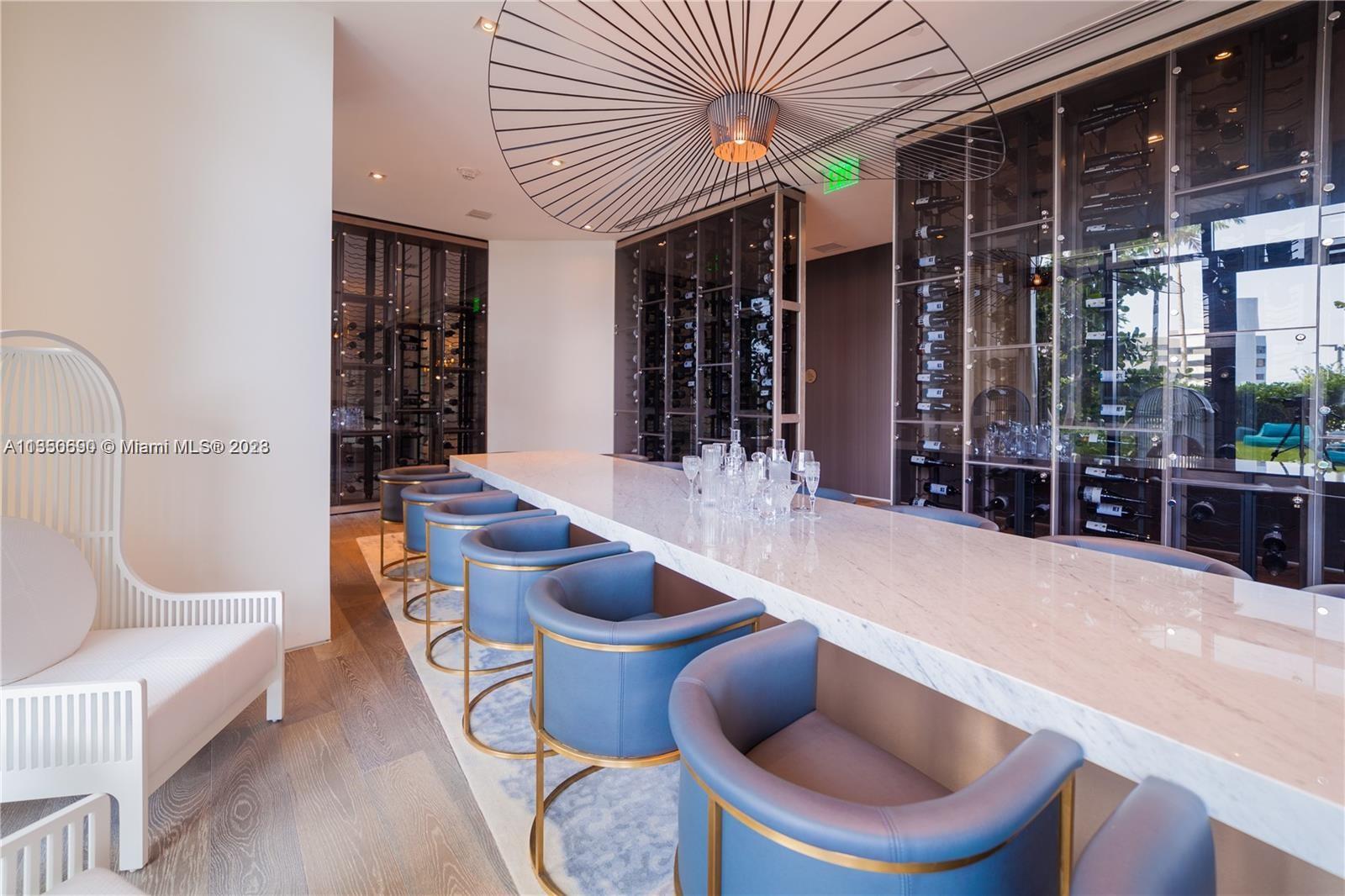 650 Northeast 32nd Street, Unit 4208 Miami, FL 33137 - Photo 10 of 18 a dining room with furniture and a potted plant