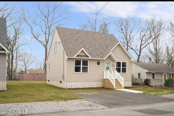 a view of a yard in front of a house