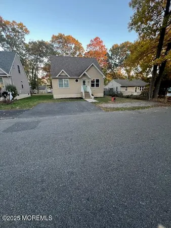 a view of big house with a street