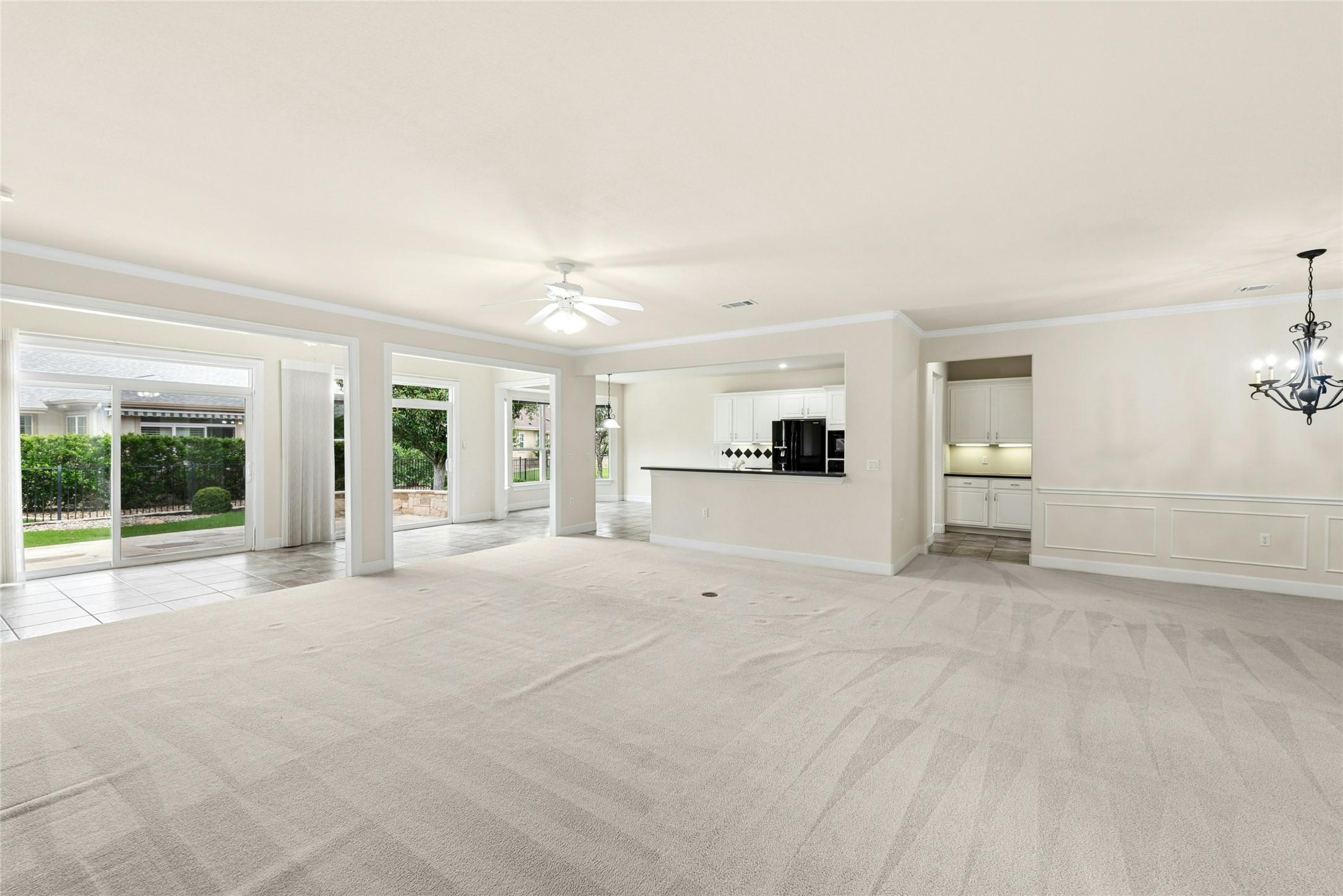 107 San Antonio Road Georgetown, TX 78633 - Photo 10 of 35 Living Room/Sun Room/Breakfast/Kitchen Combo
