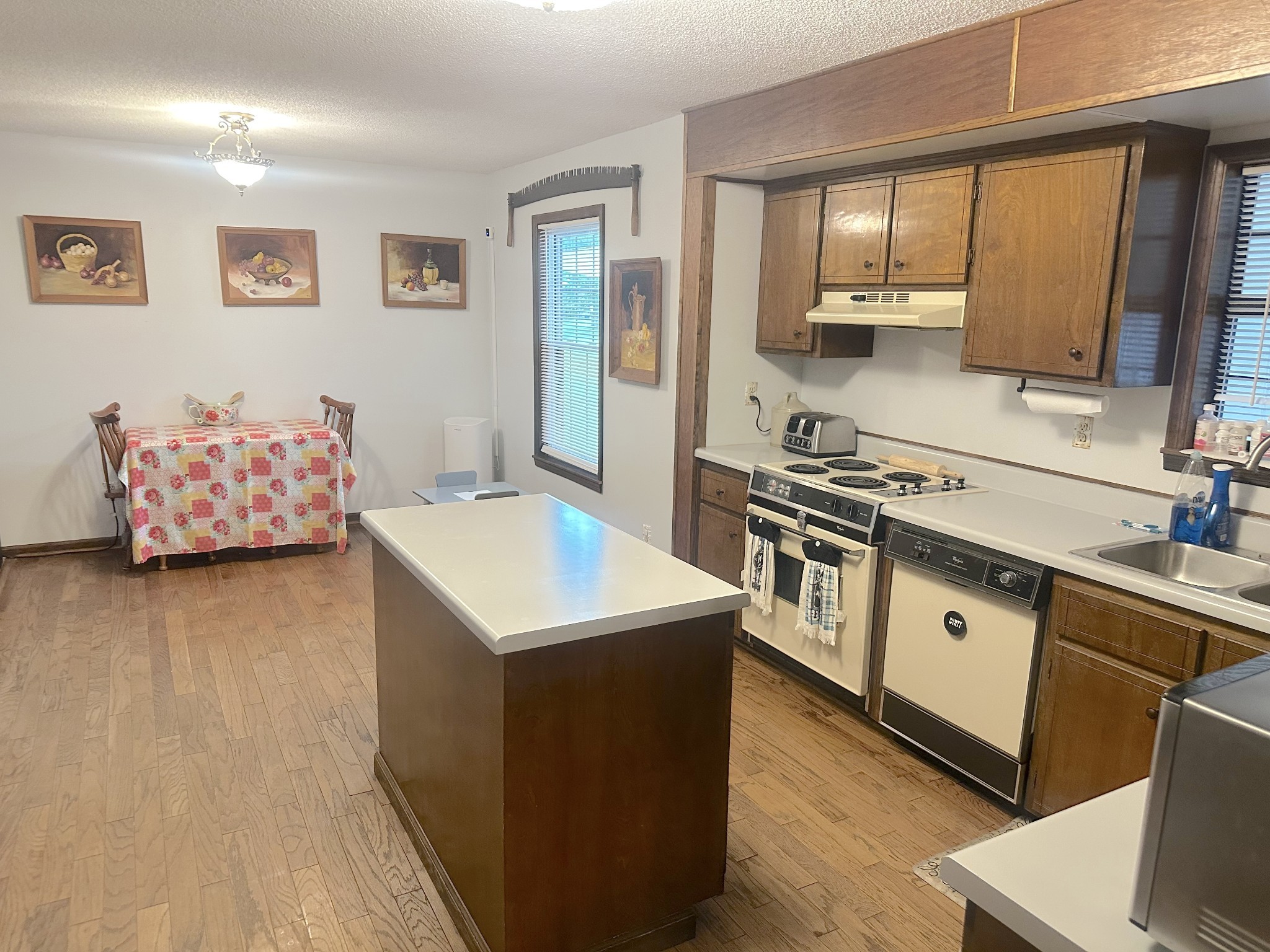 2987 Rock Road Morrison, TN 37357 - Photo 13 of 46 a kitchen with stainless steel appliances granite countertop a sink stove and refrigerator