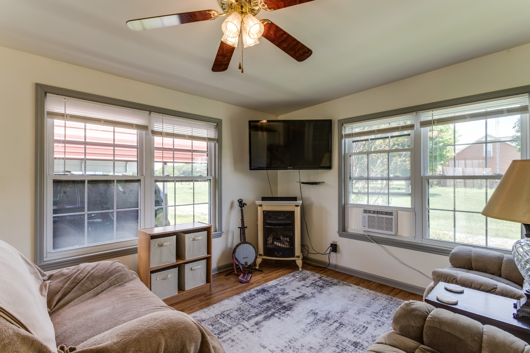 2987 Rock Road Morrison, TN 37357 - Photo 16 of 46 a living room with furniture a flat screen tv and a large window