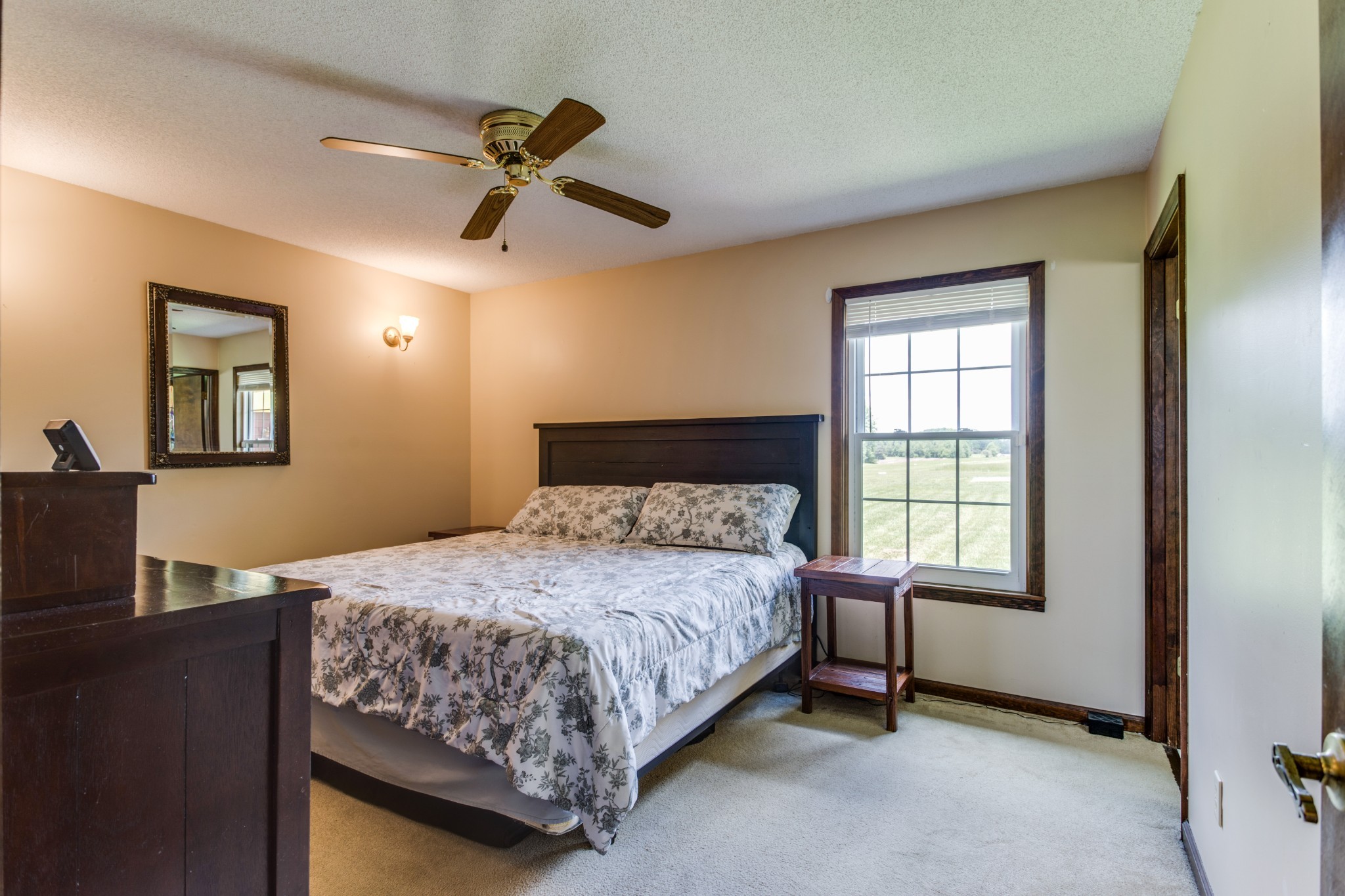 2987 Rock Road Morrison, TN 37357 - Photo 18 of 46 a bedroom with a bed and a window