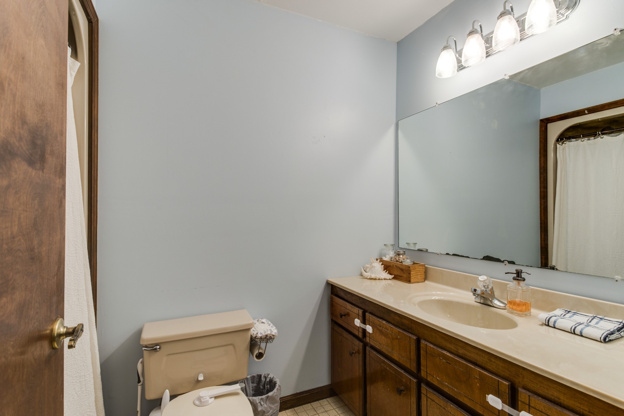 2987 Rock Road Morrison, TN 37357 - Photo 26 of 46 a bathroom with a sink vanity granite and toilet