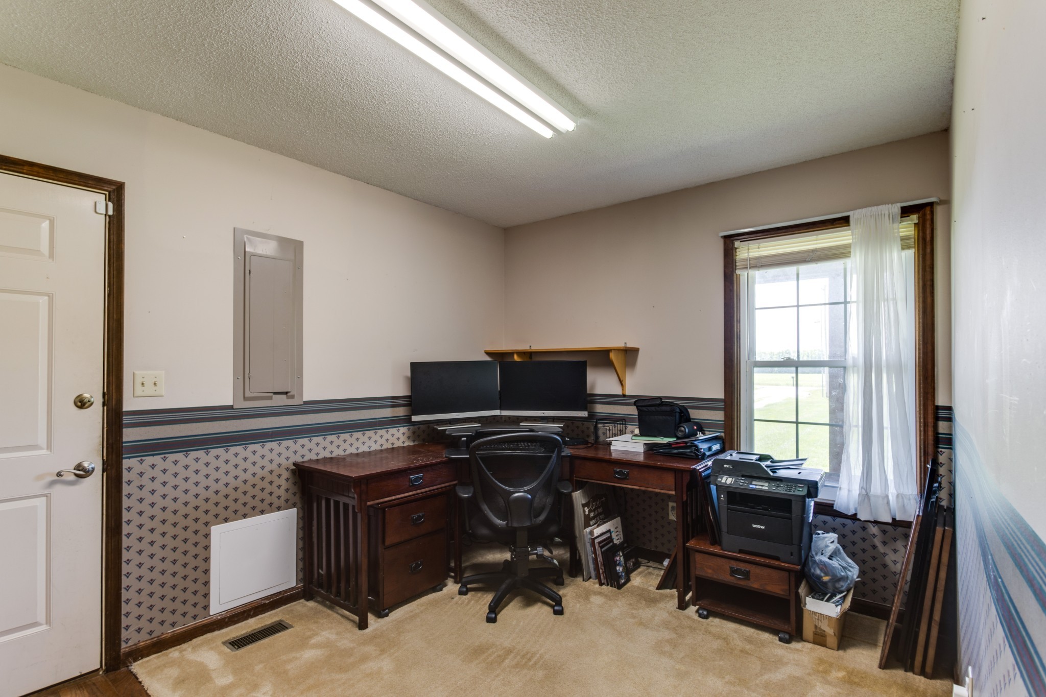 2987 Rock Road Morrison, TN 37357 - Photo 28 of 46 a view of a workspace with furniture and a window