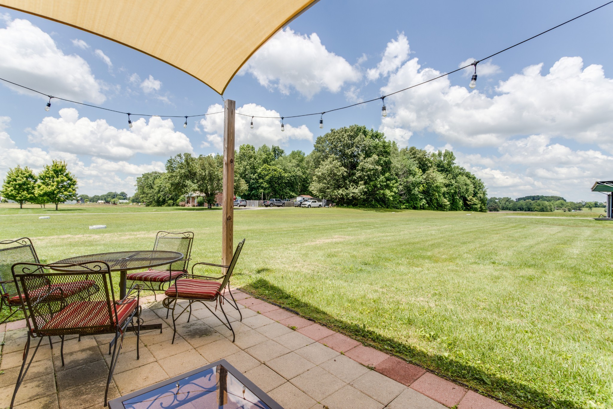 2987 Rock Road Morrison, TN 37357 - Photo 6 of 46 a view of a swimming pool and chairs in the patio