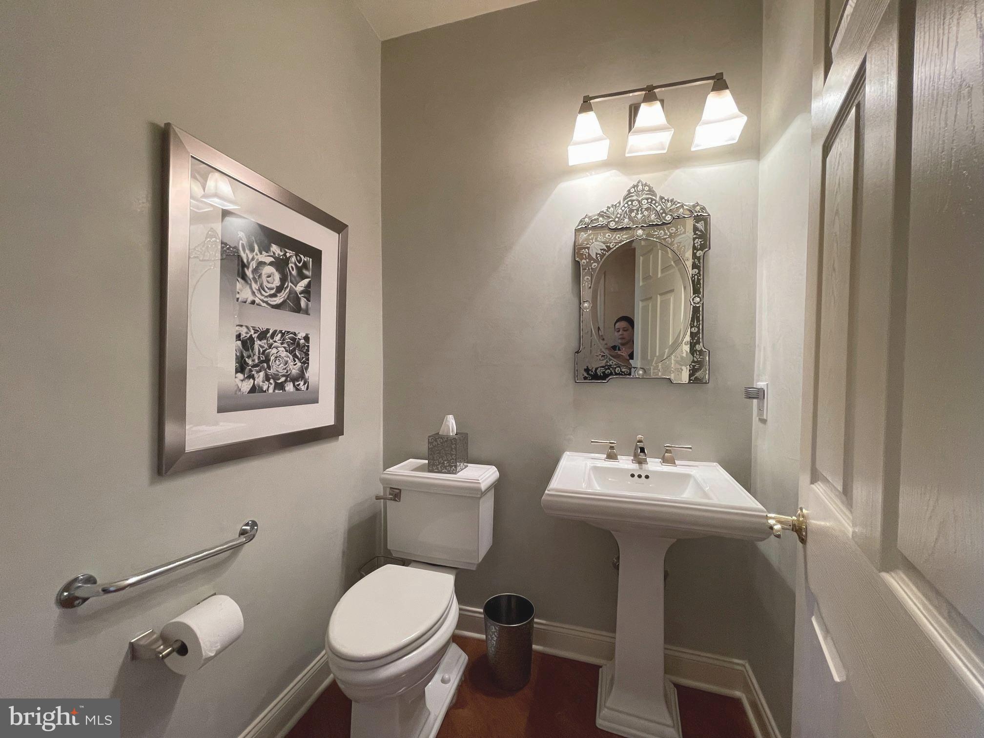 293 Sydney Road Southampton, PA 18966 - Photo 16 of 37 a bathroom with a toilet sink and mirror