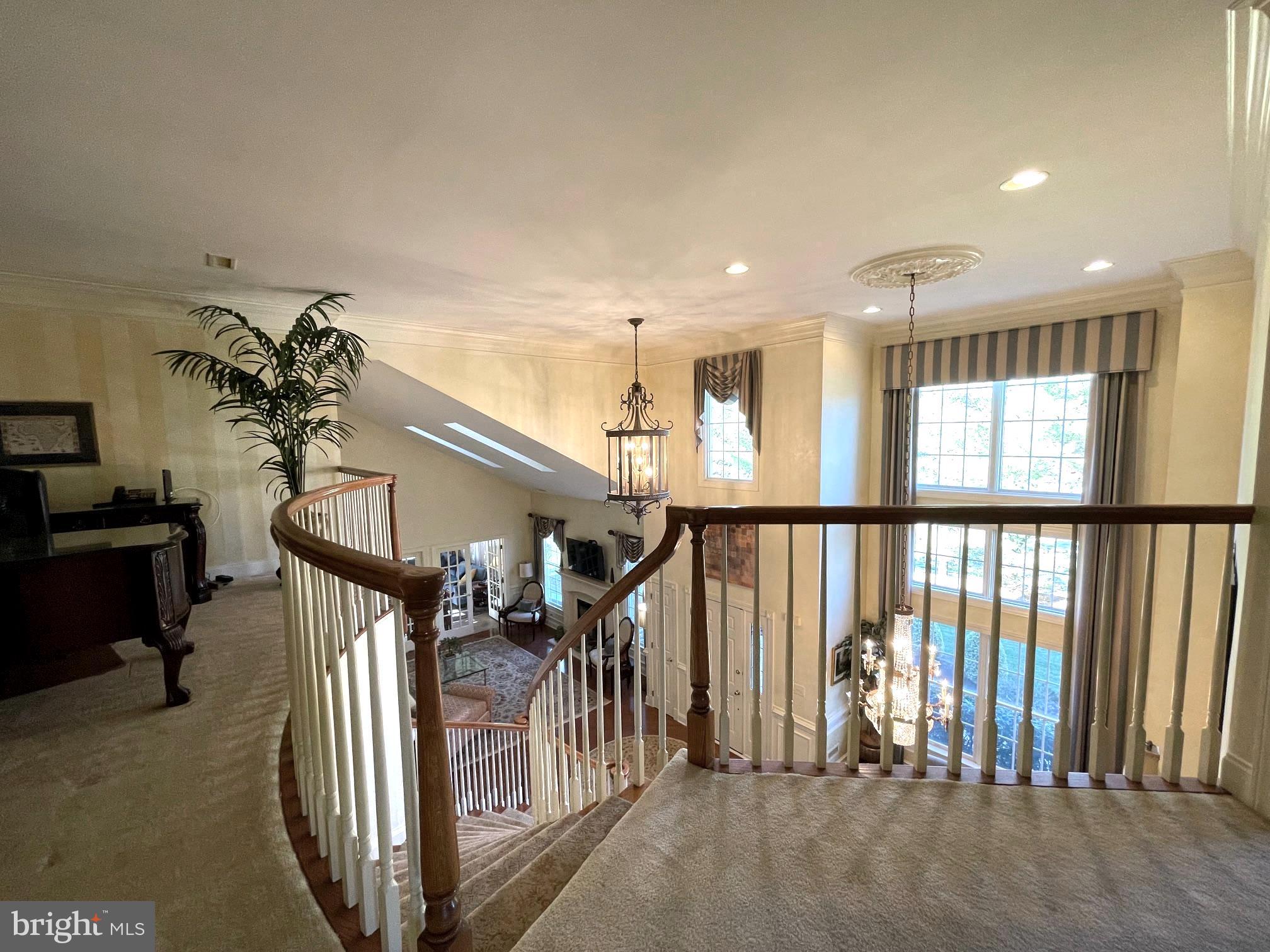 293 Sydney Road Southampton, PA 18966 - Photo 30 of 37 a view of staircase with lots of frames on wall and a window