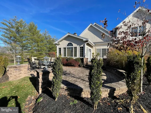 a front view of a house with patio