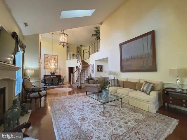 a living room with furniture or couch and a fireplace