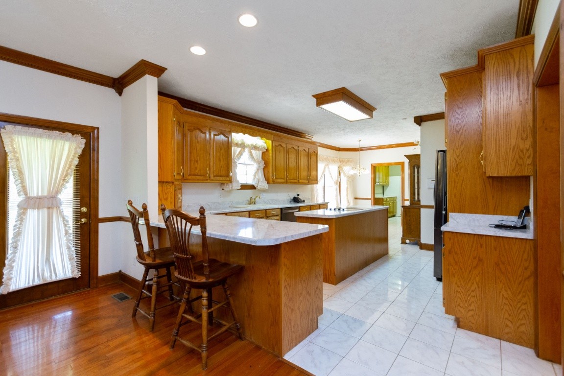 1930 Alsup Mill Road Lascassas, TN 37085 - Photo 11 of 50 a large kitchen with a table and chairs
