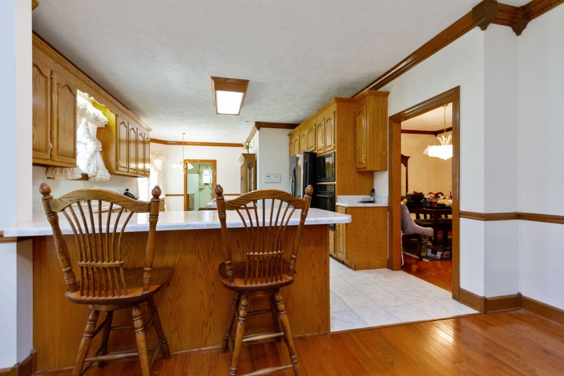 1930 Alsup Mill Road Lascassas, TN 37085 - Photo 12 of 50 a dining room with furniture and wooden floor
