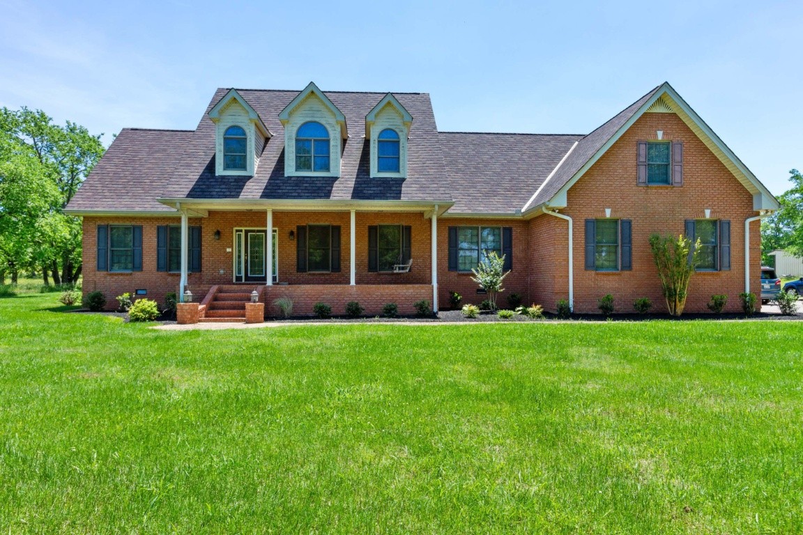 1930 Alsup Mill Road Lascassas, TN 37085 - Photo 2 of 50 a front view of house with yard and green space