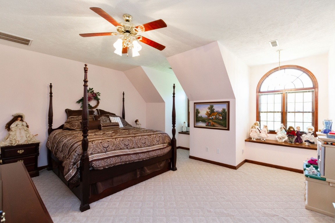 1930 Alsup Mill Road Lascassas, TN 37085 - Photo 23 of 50 a bed room with a bed and a large window