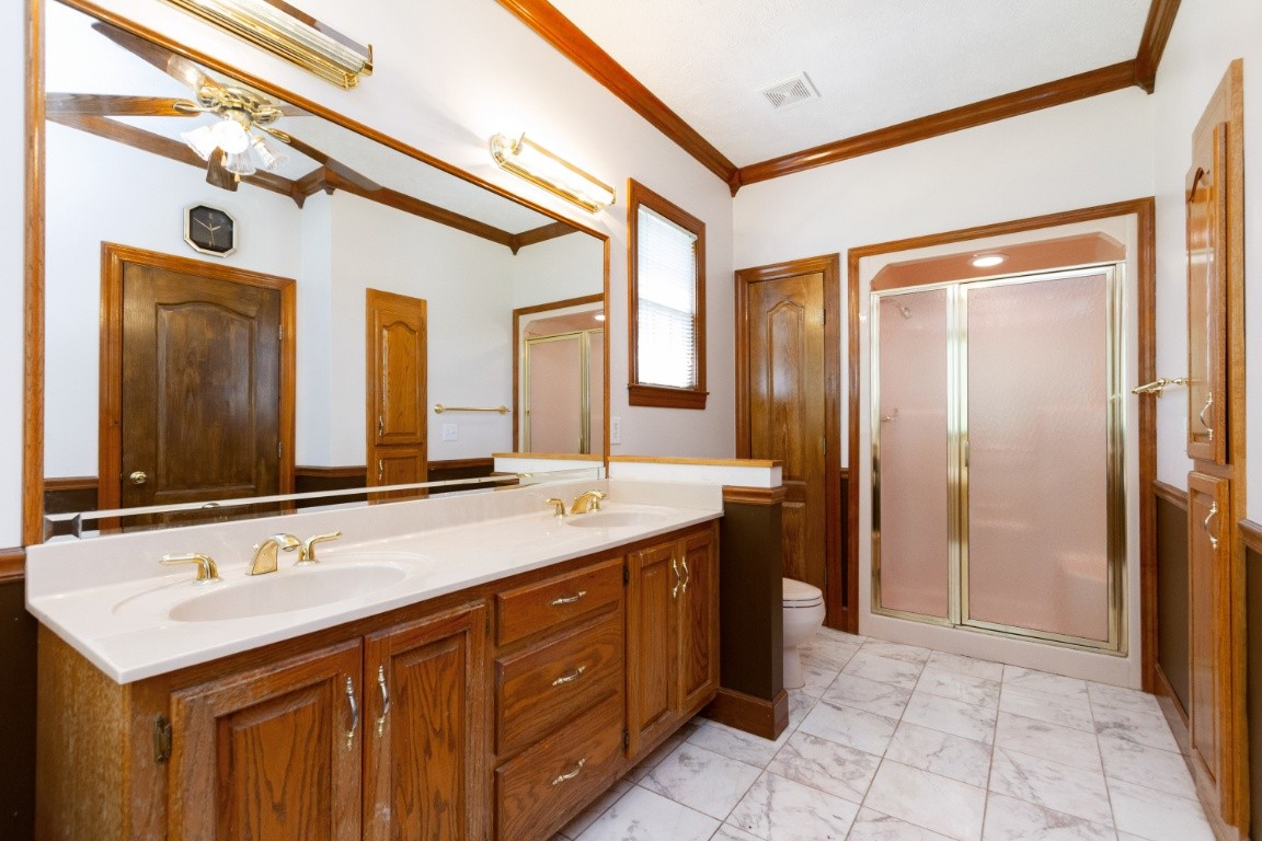1930 Alsup Mill Road Lascassas, TN 37085 - Photo 26 of 50 a bathroom with a sink and a mirror