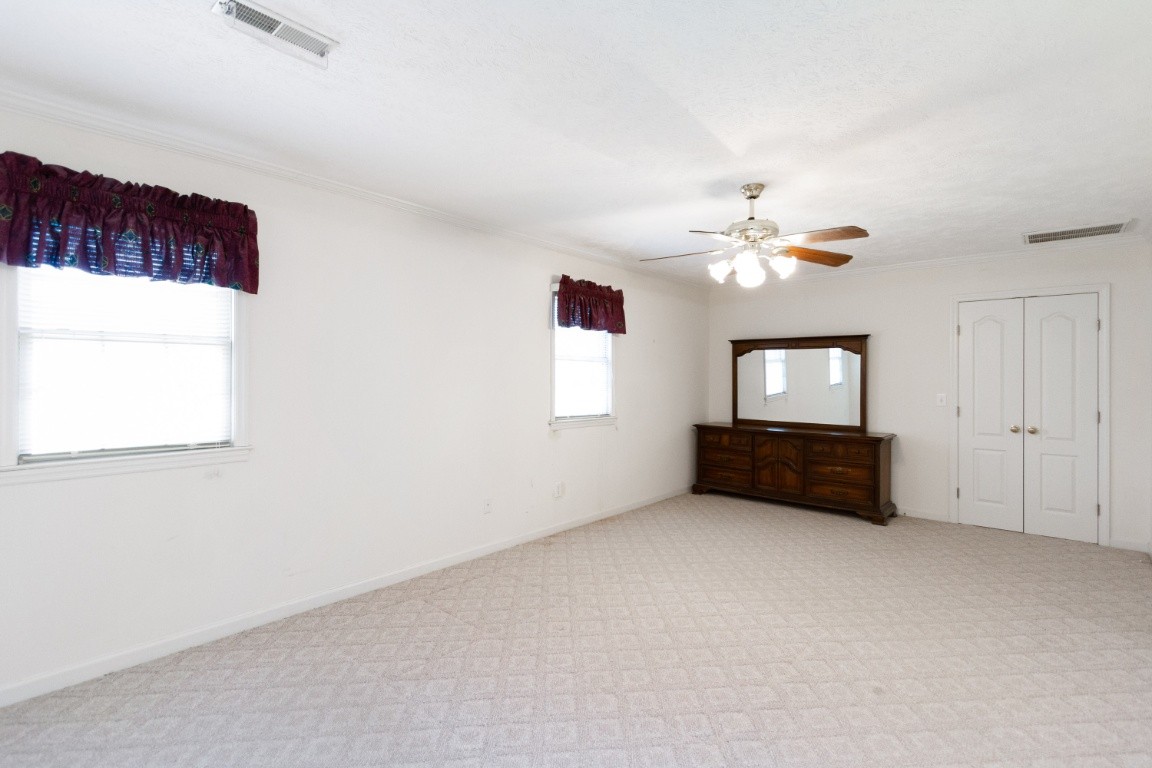 1930 Alsup Mill Road Lascassas, TN 37085 - Photo 28 of 50 an empty room with windows and fan