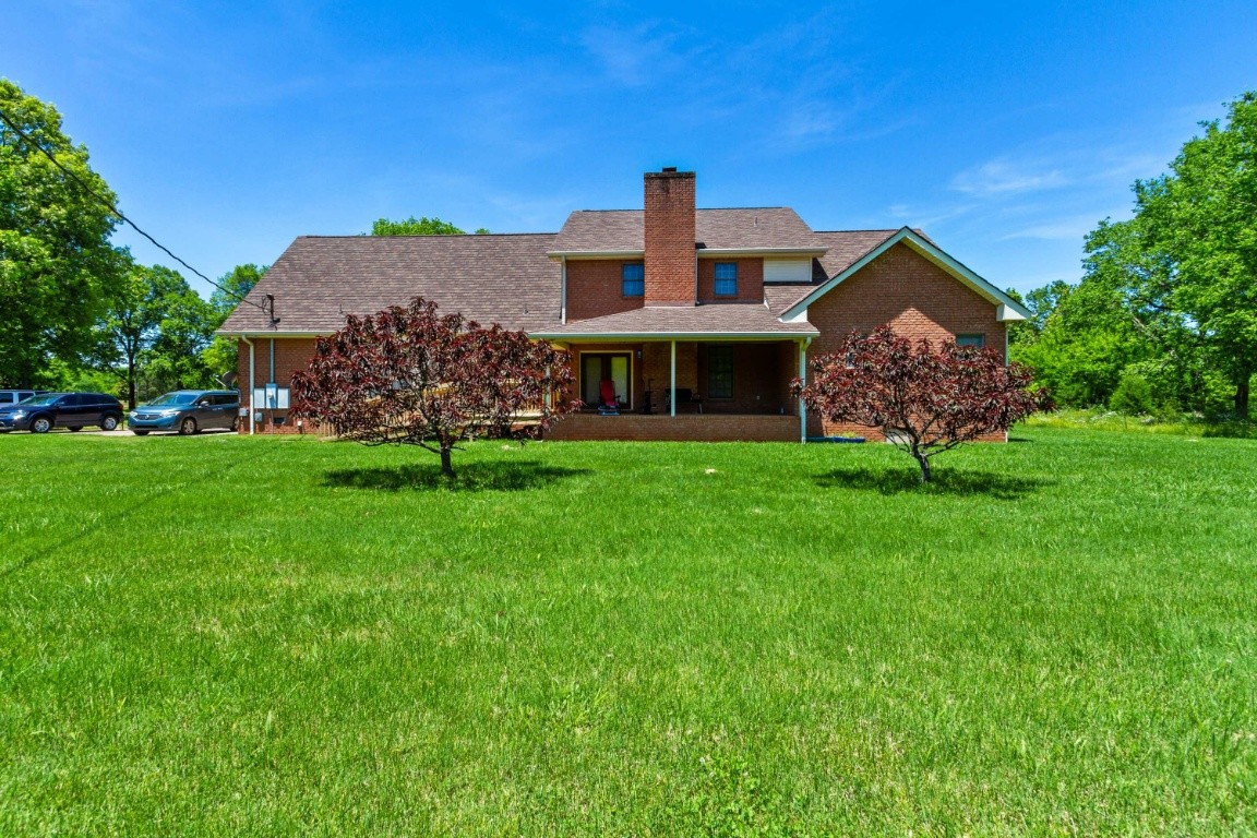 1930 Alsup Mill Road Lascassas, TN 37085 - Photo 40 of 50 a front view of a house with a garden