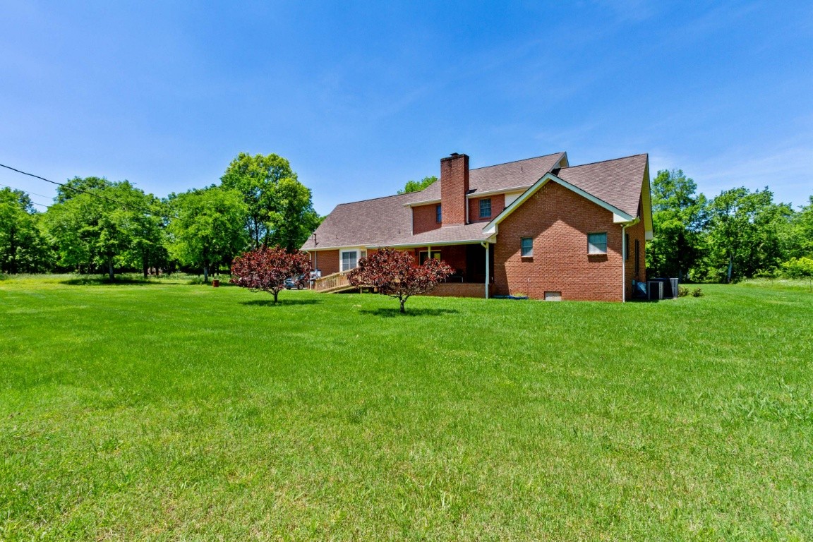 1930 Alsup Mill Road Lascassas, TN 37085 - Photo 41 of 50 a front view of a house with garden