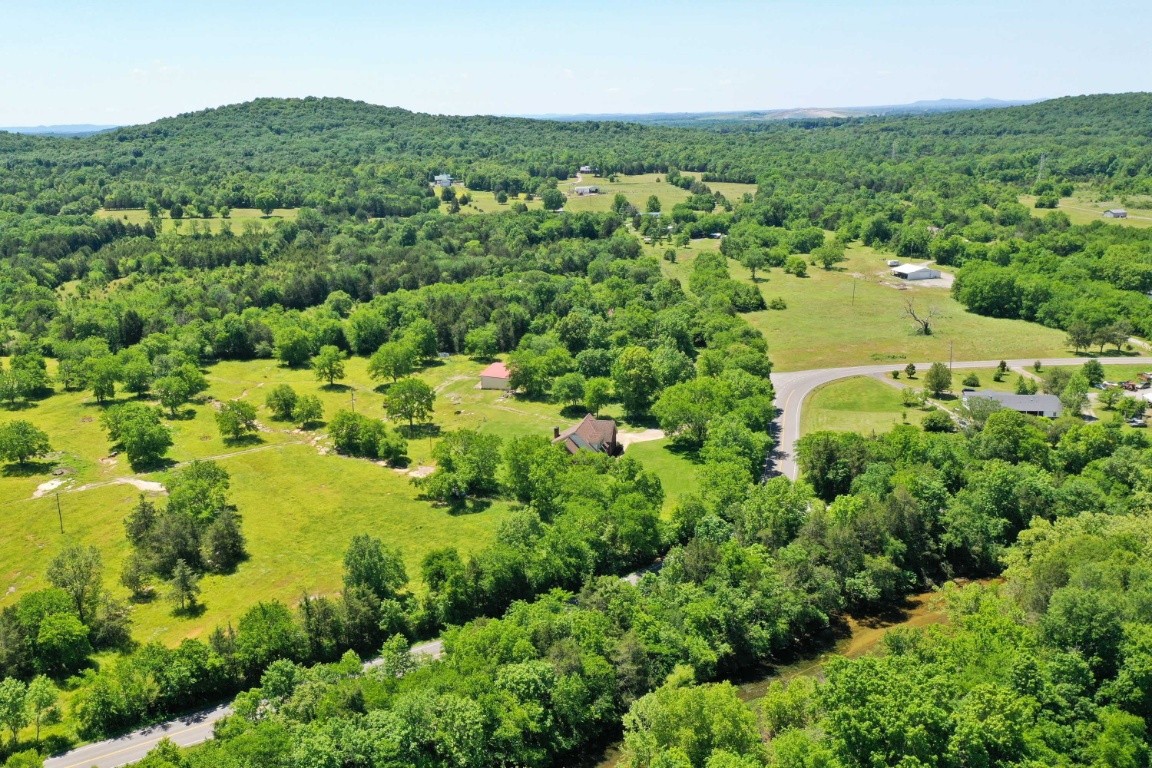 1930 Alsup Mill Road Lascassas, TN 37085 - Photo 43 of 50 an aerial view of residential houses with outdoor space and trees