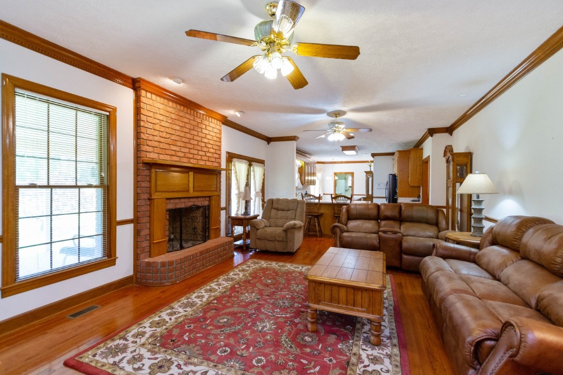 1930 Alsup Mill Road Lascassas, TN 37085 - Photo 6 of 50 a living room with furniture and a fireplace