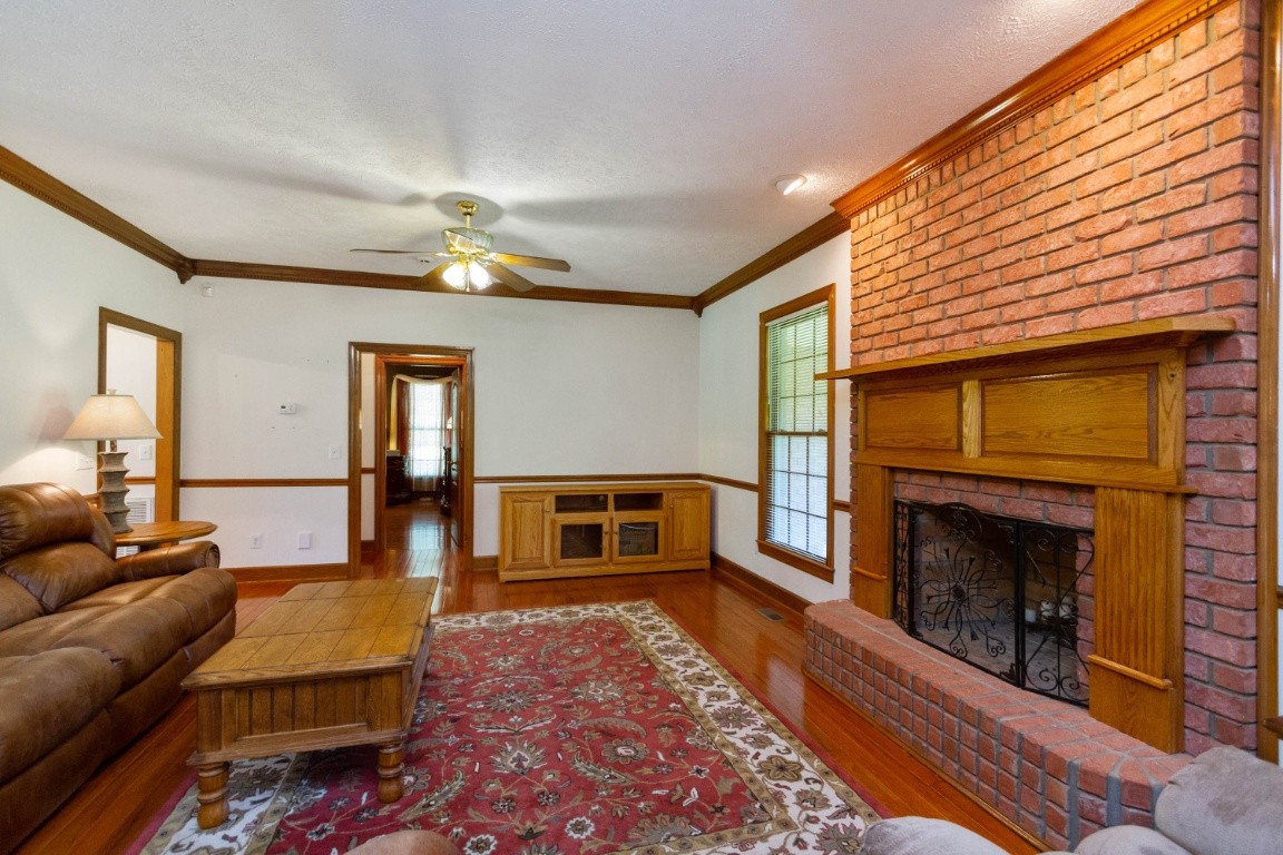 1930 Alsup Mill Road Lascassas, TN 37085 - Photo 8 of 50 a living room with furniture and a fireplace